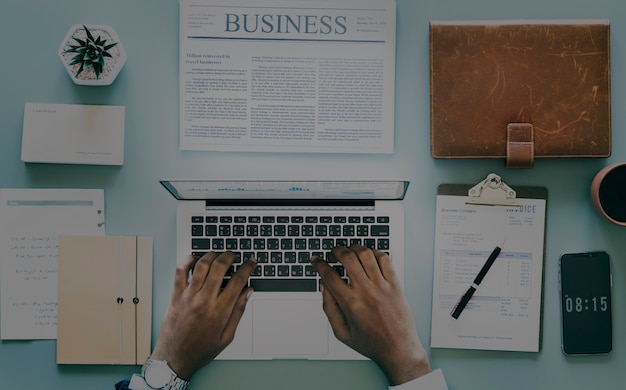 Free photo aerial view of businessman using computer laptop