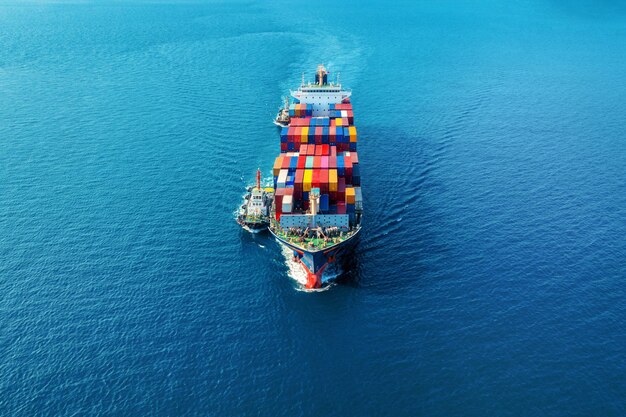 Aerial view of cargo ship with cargo container on sea