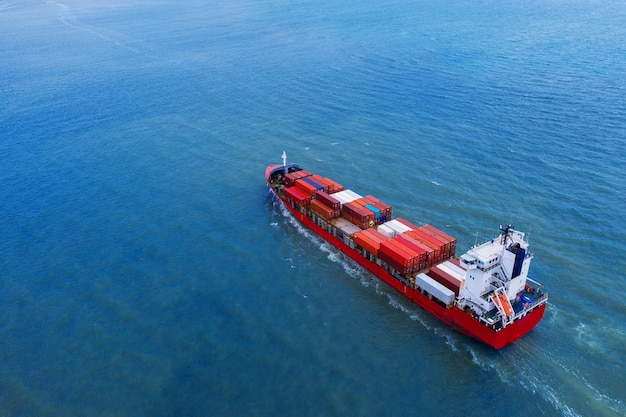 Aerial view of container cargo ship in sea.