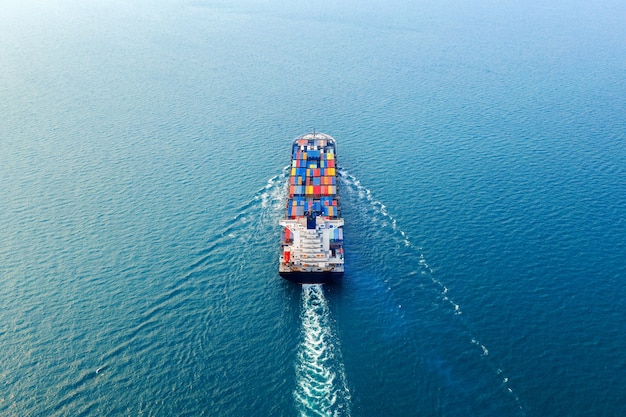 Aerial view of container cargo ship in sea.