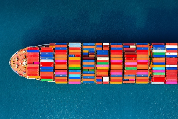 Aerial view of container cargo ship in sea.