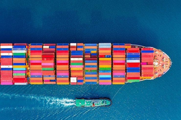 Free Photo aerial view of container cargo ship in sea.