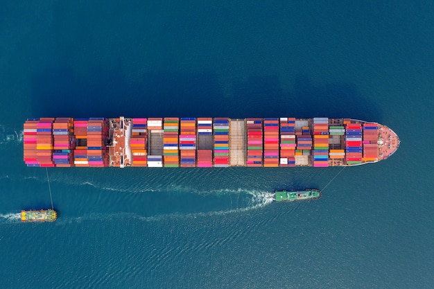 Aerial view of container cargo ship in sea.