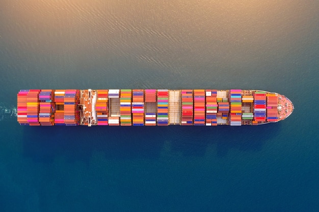 Aerial view of container cargo ship in sea.