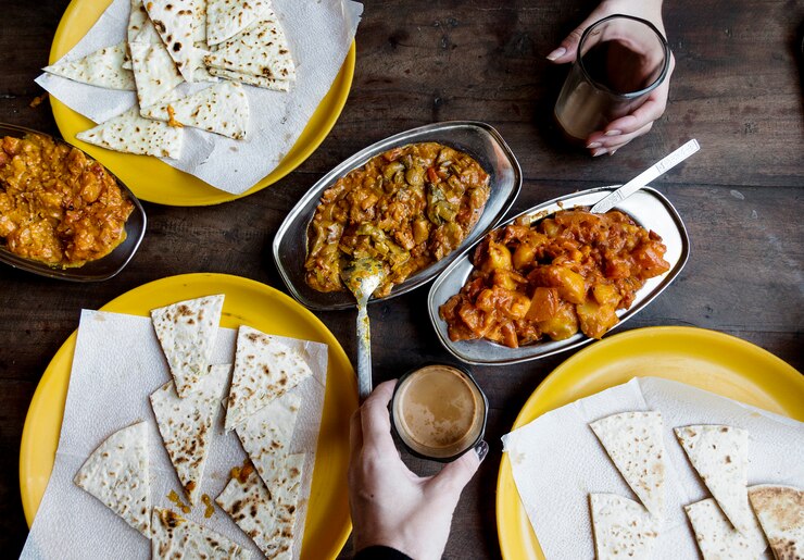 Free Photo aerial view of couple enjoying rajasthani cuisine