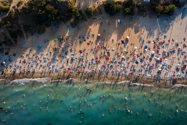 Aerial View of Crowd of People on the Beach