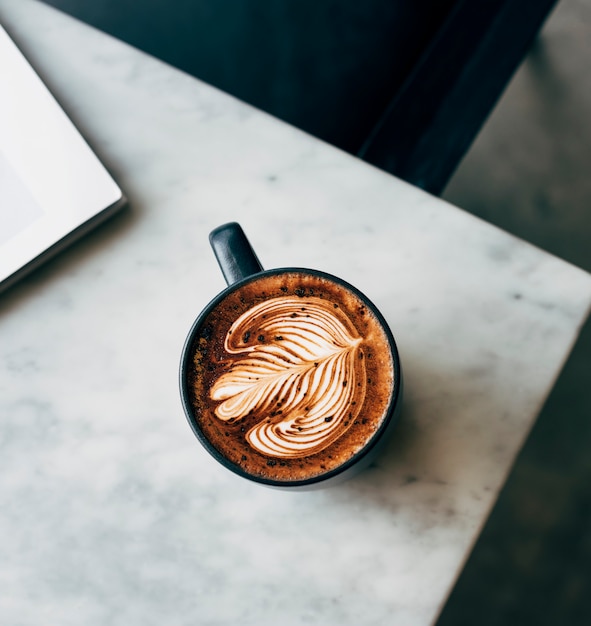 Aerial view of a cup of coffee on a table