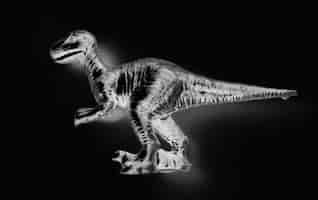 Free photo aerial view of dinosaur toy with negative effects