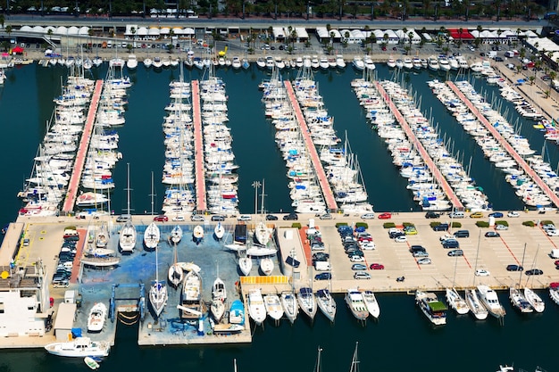  aerial view of docked yachts in Port Olimpic. Barcelona 