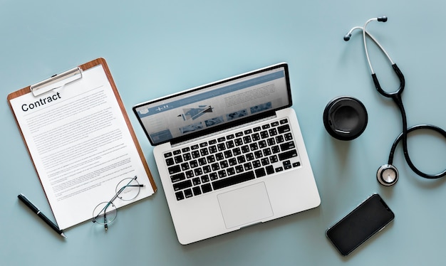 Aerial view of doctor stethoscope and computer laptop