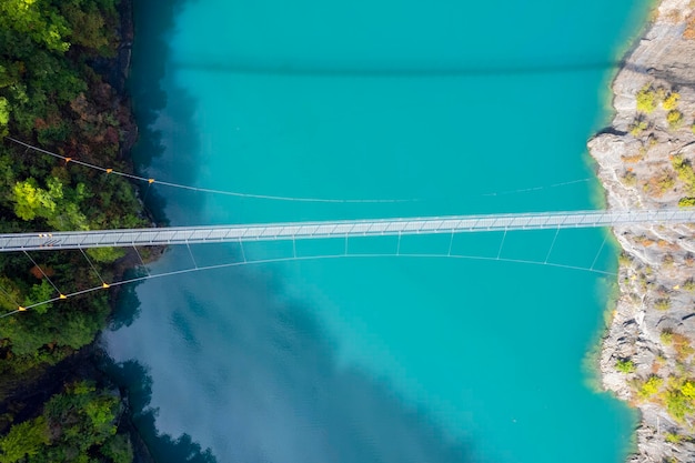 Free photo aerial view of himalayan footbridge crossing the drac near lake monteynard