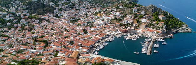 Aerial view of the Hydra island in Greece with boats on the port