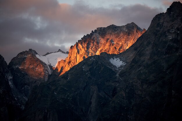 Aerial view of mountains with a cloudy sky