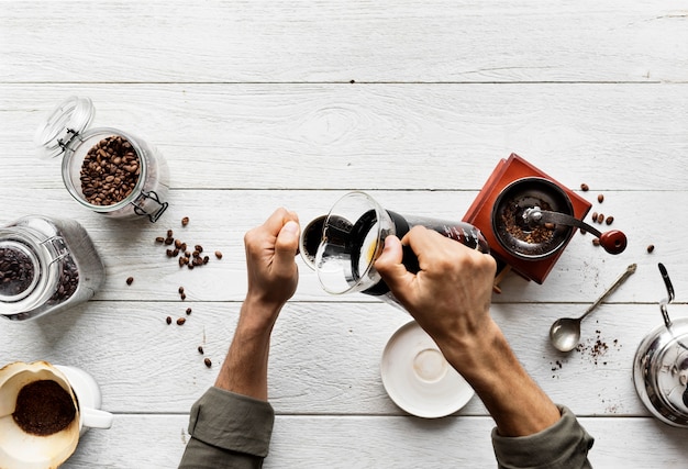 Aerial view of people making drip coffee