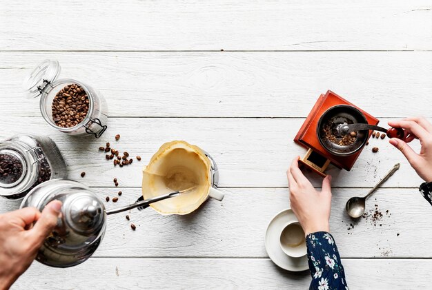 Aerial view of people making drip coffee