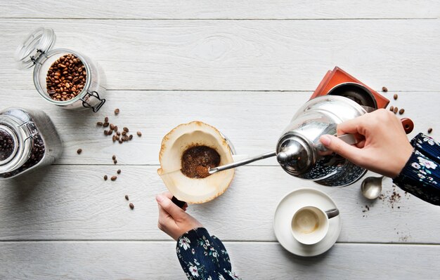 Aerial view of people making drip coffee