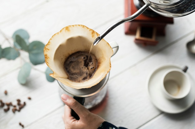 Aerial view of a person making drip coffee