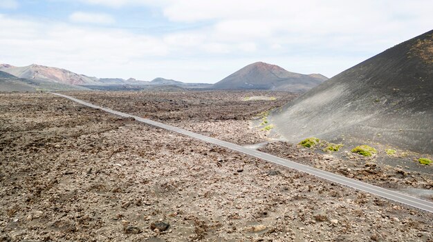 Aerial view of road with mountains