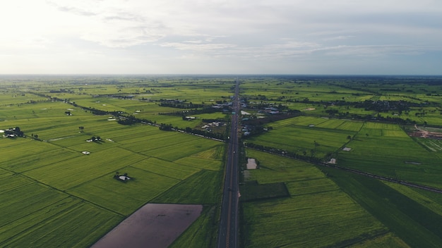 Aerial view over small village, Country roadside.