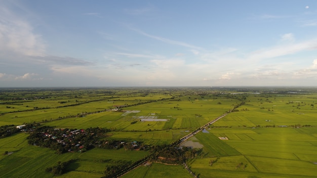 Aerial view over small village, Country roadside.