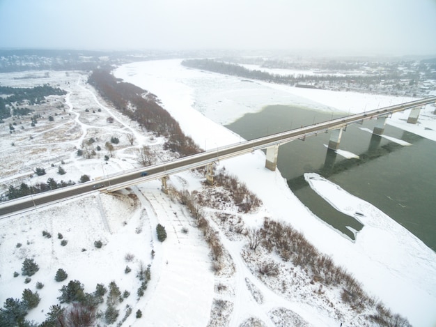 Aerial view of snow covered countryside