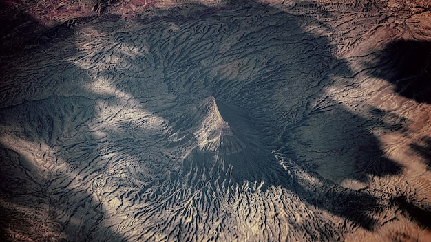 Free photo aerial view of snowy mountain