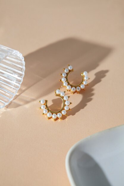 Aesthetic golden earrings with pearls