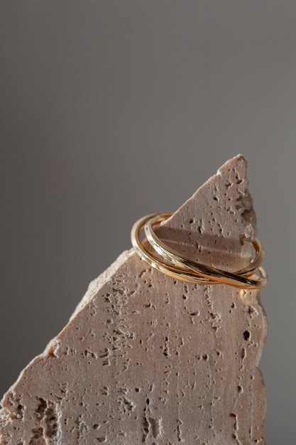 Aesthetic golden earrings with rock