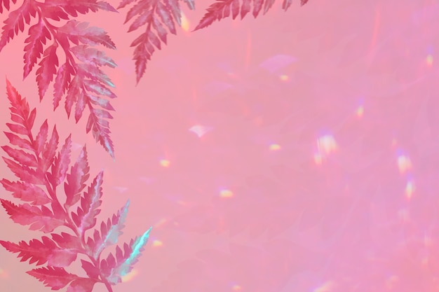 Free photo aesthetic leaves on pink border background