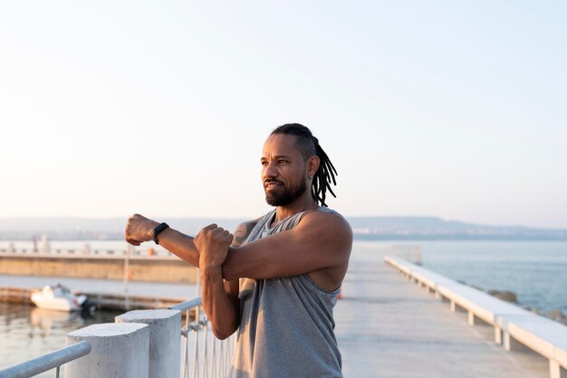 African american athlete exercising outdoors