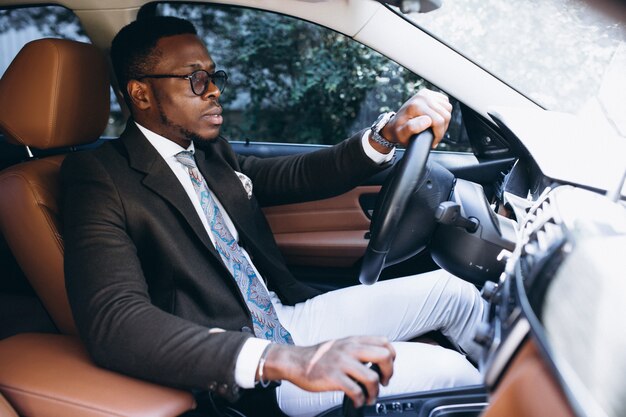 African american business man in car