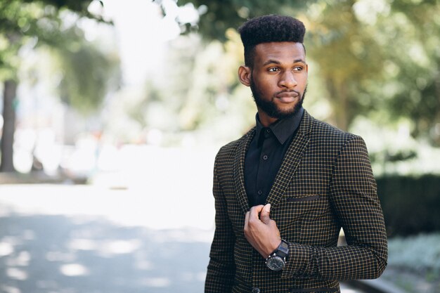 African american business man in suit outside in the street