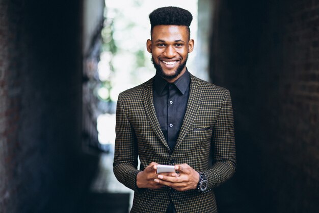 African american business man with phone