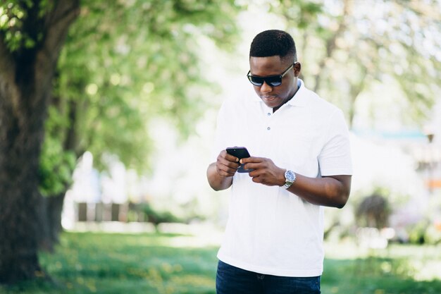 African american business man with phone