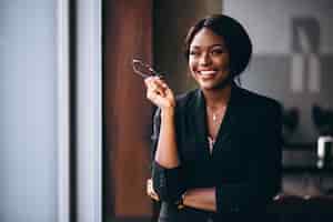 Free photo african american business woman by the window