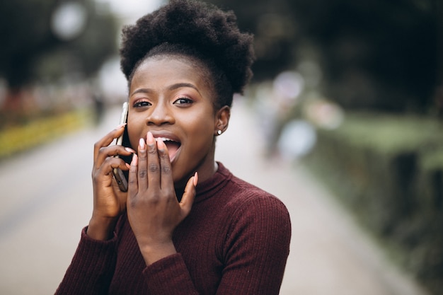 African american business woman with phone