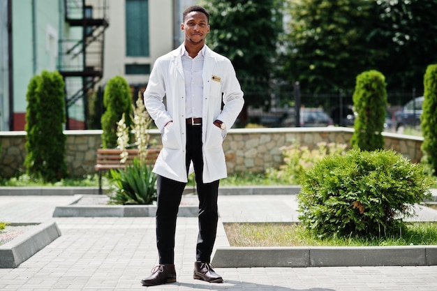 African american doctor male at lab coat with stethoscope outdoor