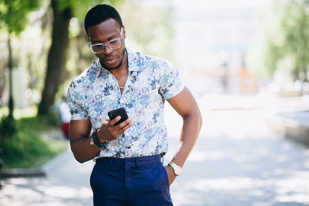 African american fit man with phone