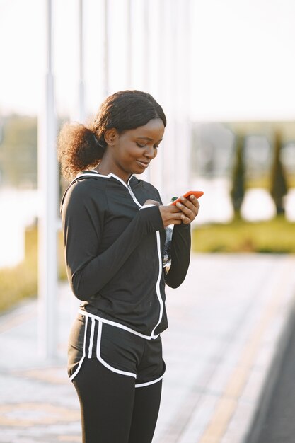 African american fitness model training outdoors