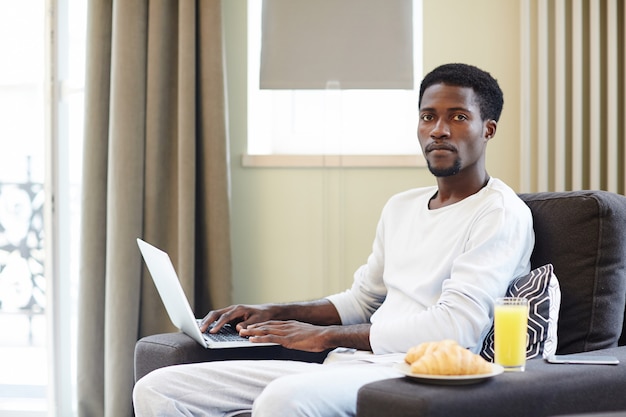 African American Freelancer Working from Home