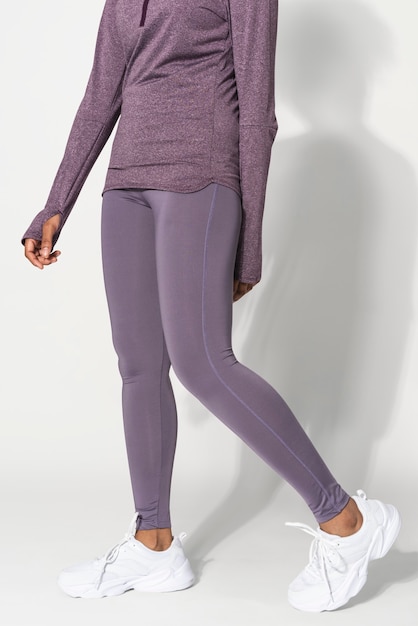 African American girl in purple yoga pants studio portrait
