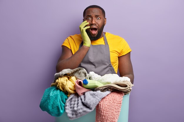 African American man doing laundry