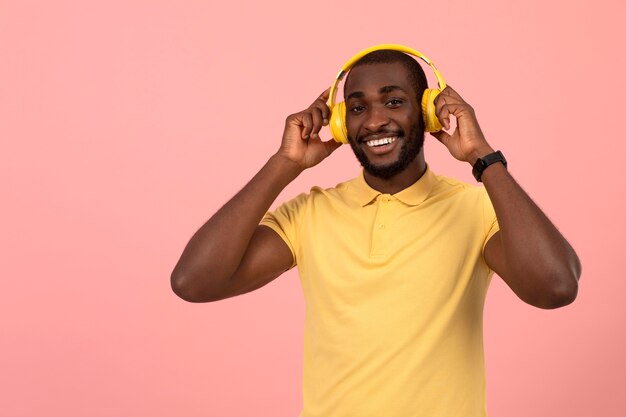African american man listening to music on headphones