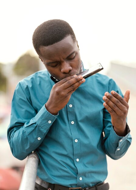 African american man playing music on jazz day