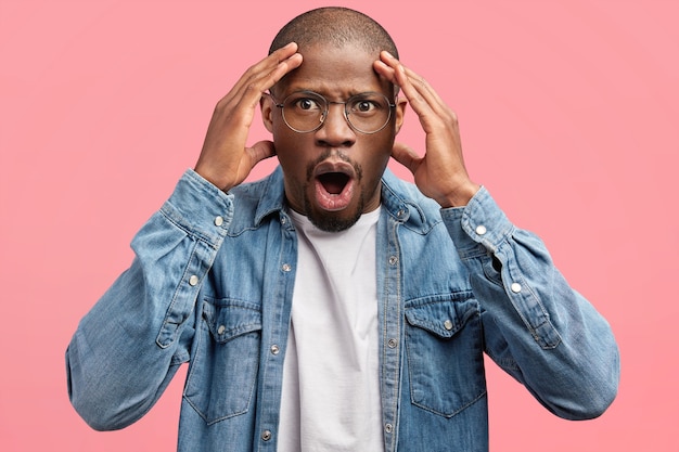 African-American man wearing denim shirt