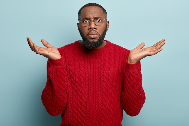 african american man wearing red sweater