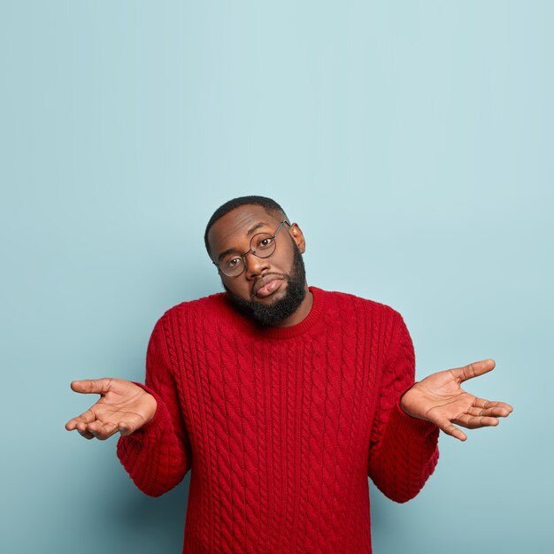 african american man wearing red sweater
