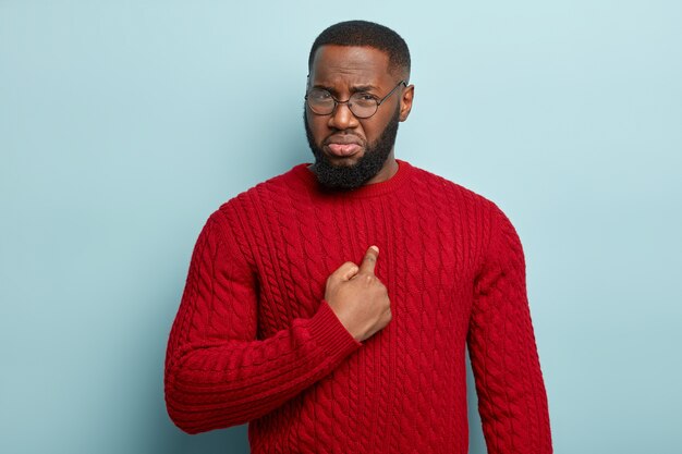 African American man wearing red sweater
