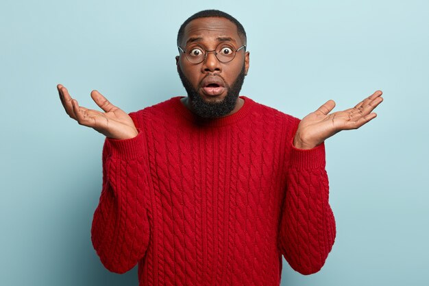 african american man wearing red sweater