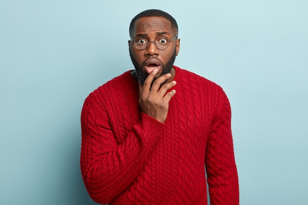 Free photo african american man wearing red sweater